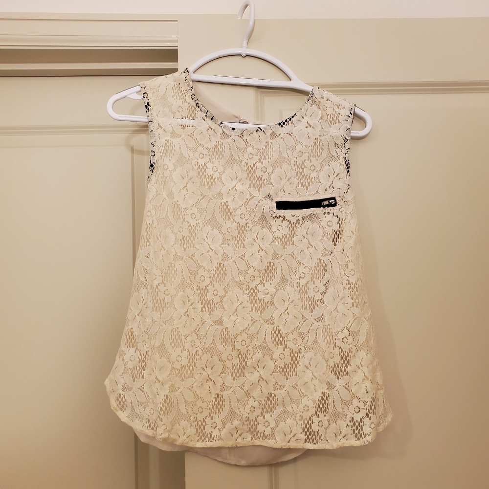 Lacy blouse with see through back